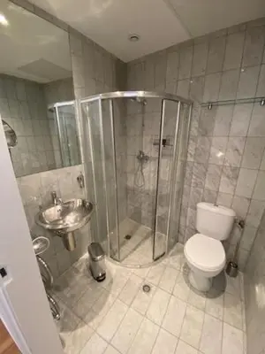 Salle de bains dans l'établissement L'enclave intime