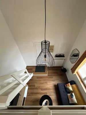 Coin salon dans l'établissement Charmant Duplex parking en option