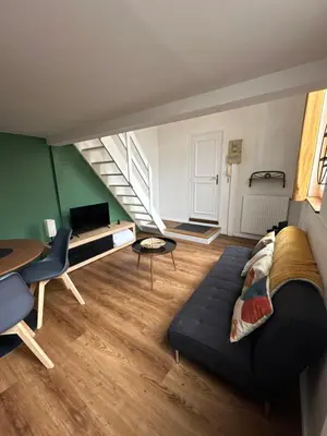 Un ou plusieurs lits dans un hébergement de l'établissement Charmant Duplex parking en option