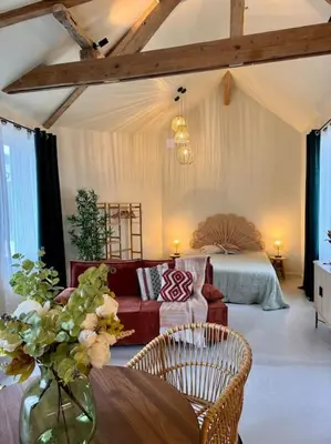 Coin salon dans l'établissement Charmant loft intime