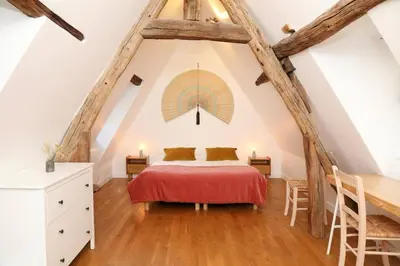 Un ou plusieurs lits dans un hébergement de l'établissement Maison Emily in Senlis by La Boîte En Plus
