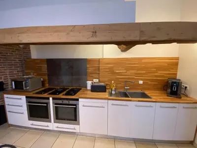 Cuisine ou kitchenette dans l'établissement Chez Victor H