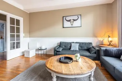 Coin salon dans l'établissement Magnifique 3 Chambres - Parking - Hyper Centre - Gare