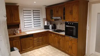 Cuisine ou kitchenette dans l'établissement Le Paris Normand