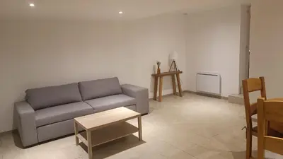 Coin salon dans l'établissement Le Paris Normand