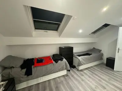 Un ou plusieurs lits dans un hébergement de l'établissement Appartement neuf 2 chambres 8 couchages - FETES INTERDITES proche sonelo