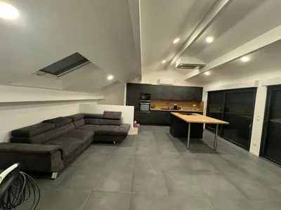 Coin salon dans l'établissement Appartement neuf 2 chambres 8 couchages - FETES INTERDITES proche sonelo