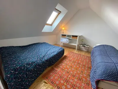 Un ou plusieurs lits dans un hébergement de l'établissement La Maison du Chemin Vert