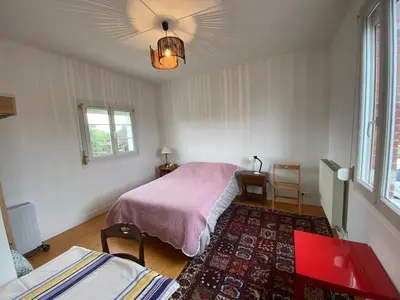 Un ou plusieurs lits dans un hébergement de l'établissement La Maison du Chemin Vert