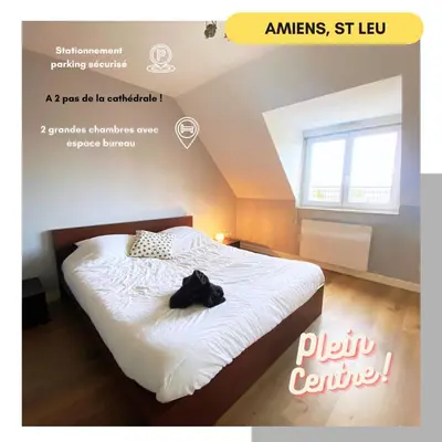 Un ou plusieurs lits dans un hébergement de l'établissement 2 chambres Hyper centre avec place de Parking et WIFI
