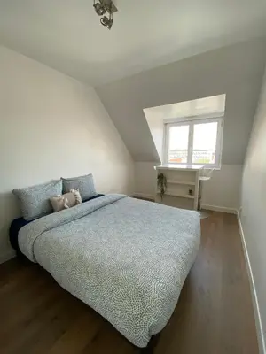 Un ou plusieurs lits dans un hébergement de l'établissement 2 chambres Hyper centre avec place de Parking et WIFI