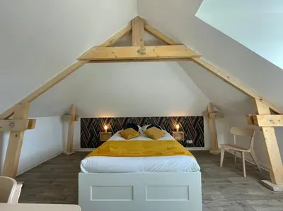 Un ou plusieurs lits dans un hébergement de l'établissement Thuit de l'Oison - Superbe appartement F2 duplex
