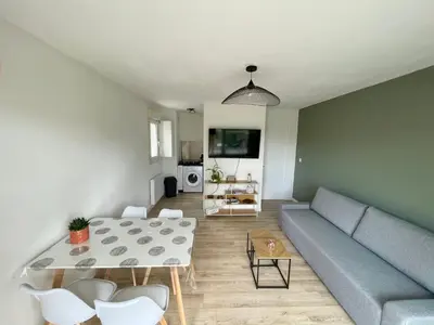 Coin salon dans l'établissement Appartement avec Loggia et Parking privé