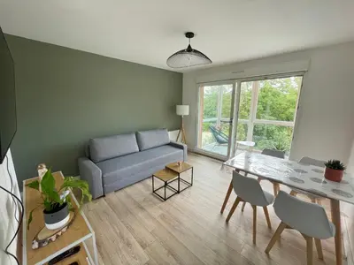 Coin salon dans l'établissement Appartement avec Loggia et Parking privé