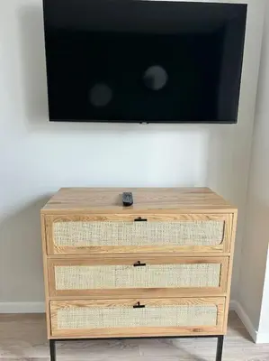 Télévision ou salle de divertissement dans l'établissement Terasse avec superbe vue sur le marché de Dieppe