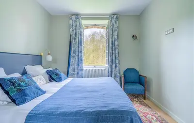 Un ou plusieurs lits dans un hébergement de l'établissement Magnifique Maison Avec Piscine