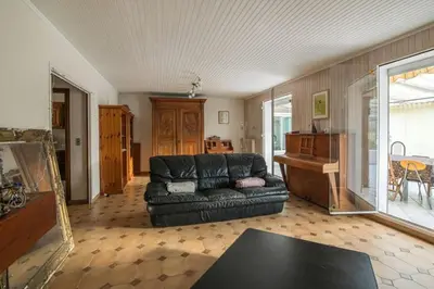 Coin salon dans l'établissement Gîte du Hérisson
