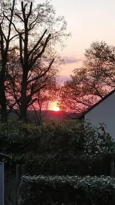 Lever ou coucher de soleil vu de la maison de vacances ou à proximité