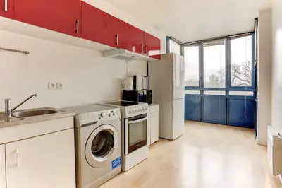 Cuisine ou kitchenette dans l'établissement L'Abri Douillet - Mantes la jolie