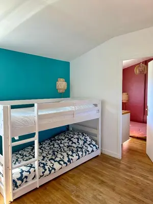 Un ou plusieurs lits dans un hébergement de l'établissement Villa Sand Wedge 7 à 9 couchages