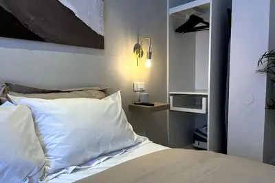 Un ou plusieurs lits dans un hébergement de l'établissement Le Macquet Vion *Best Quality* Amiens Center