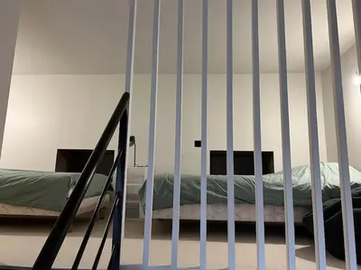 Un ou plusieurs lits dans un hébergement de l'établissement Loft convivial et spacieux, comme une maison