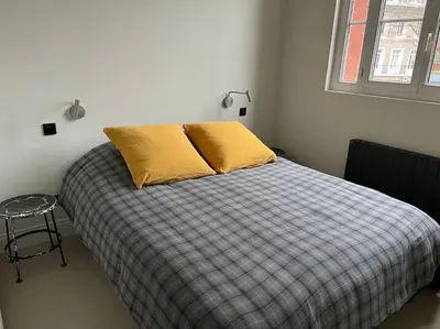 Un ou plusieurs lits dans un hébergement de l'établissement Loft convivial et spacieux, comme une maison