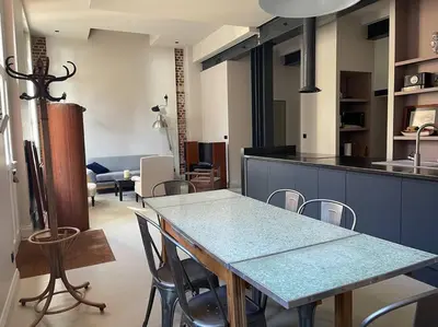 Coin salon dans l'établissement Loft convivial et spacieux, comme une maison