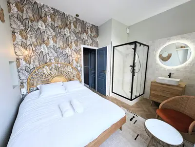 Un ou plusieurs lits dans un hébergement de l'établissement Elégante maison amiénoise - proche gare, home-cinéma, 3 chambres doubles, 1 chambre familiale avec jacuzzi privatif - La Maison Des Petits Sablon