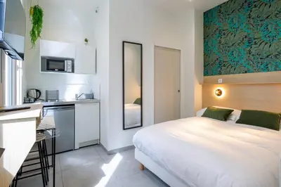 Cuisine ou kitchenette dans l'établissement Appartement 1 proche de la gare et du centre ville