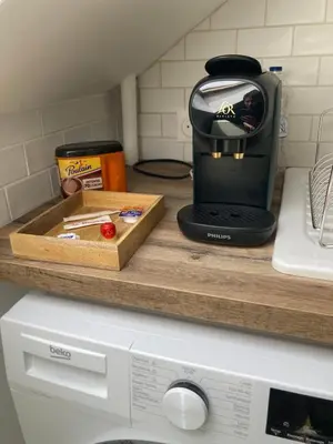 Cuisine ou kitchenette dans l'établissement Studio confortable et fonctionnel proche gare