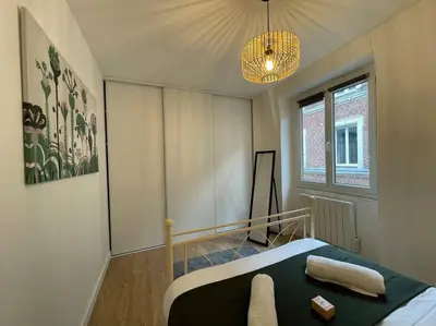 Un ou plusieurs lits dans un hébergement de l'établissement L'Escale de Saint Maclou-Rouen centre Historique