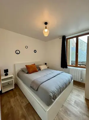 Un ou plusieurs lits dans un hébergement de l'établissement Appartement idéalement situé au cœur de Dieppe