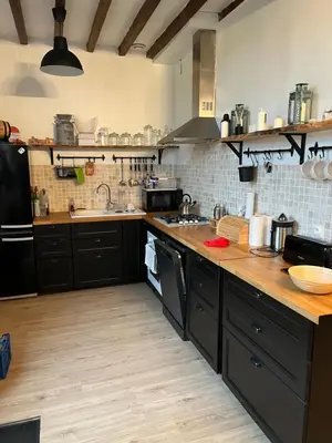 Cuisine ou kitchenette dans l'établissement Maison Normandie