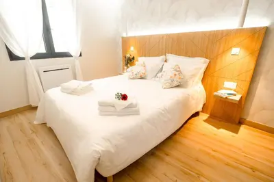 Un ou plusieurs lits dans un hébergement de l'établissement La Confortable - Spacieux T3 familial 6pers - Bonn'appartts-sur-Seine