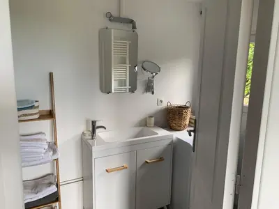 Salle de bains dans l'établissement Oasis Entre Terre et Mer