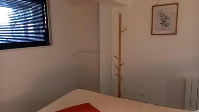 Un ou plusieurs lits dans un hébergement de l'établissement Appartement individuel en maison