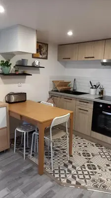 Cuisine ou kitchenette dans l'établissement Appartement individuel en maison