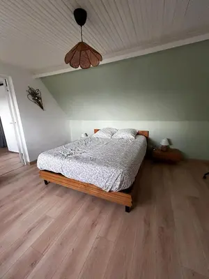 Un ou plusieurs lits dans un hébergement de l'établissement Le cottage des quatre vents