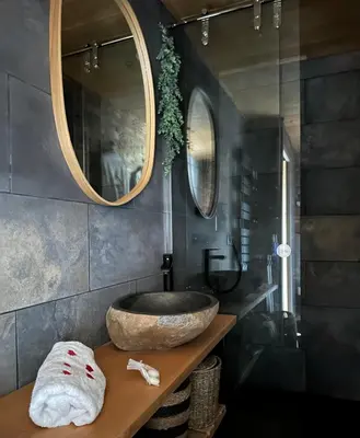 Salle de bains dans l'établissement Coeur de Lodge spa privatif