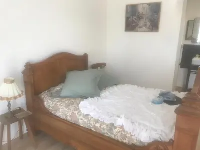 Un ou plusieurs lits dans un hébergement de l'établissement PROCHE MANOIR CAULIERES 2 rue d En Haut