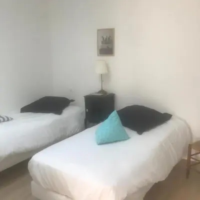 Un ou plusieurs lits dans un hébergement de l'établissement PROCHE MANOIR CAULIERES 2 rue d En Haut