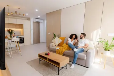 Coin salon dans l'établissement La cosy - Moderne - Pro ou couple av Enfants - Entrer autonome -Les Bonn'appartts-sur-Seine