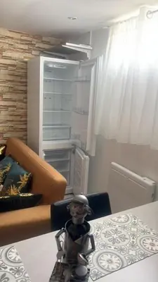 Coin salon dans l'établissement Appartement indépendant chez l'habitant
