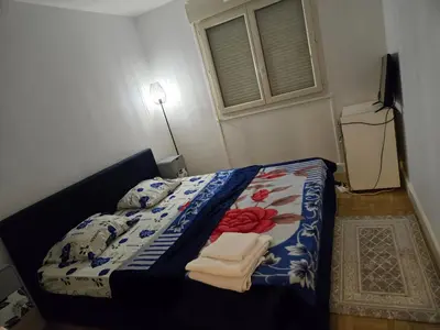 Un ou plusieurs lits dans un hébergement de l'établissement Appartement T3 tout confort