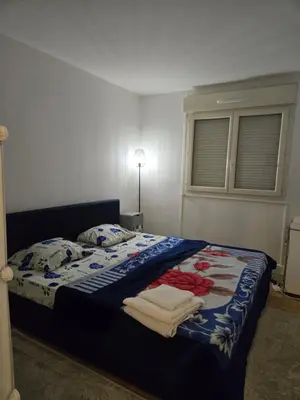 Un ou plusieurs lits dans un hébergement de l'établissement Appartement T3 tout confort