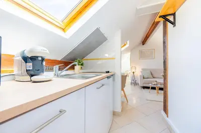 Cuisine ou kitchenette dans l'établissement Le Cocon Proche Paris Stellantis