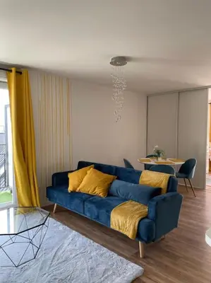 Coin salon dans l'établissement Appartement 3P Gare Terrasse et Parking privé