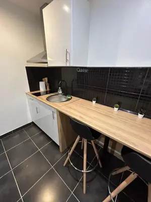 Cuisine ou kitchenette dans l'établissement appartement ILLUSION