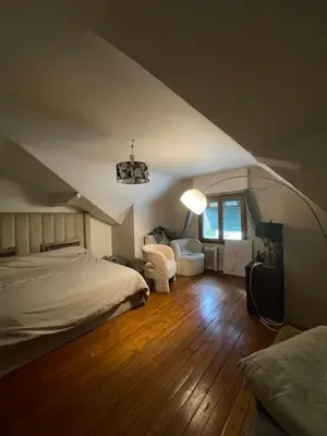 Un ou plusieurs lits dans un hébergement de l'établissement Maison 20 min de PARIS